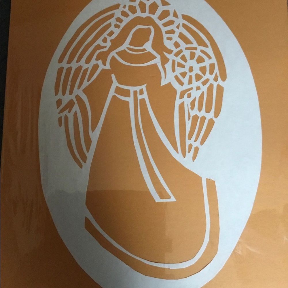 Hand cut angel art on gold background seasonal